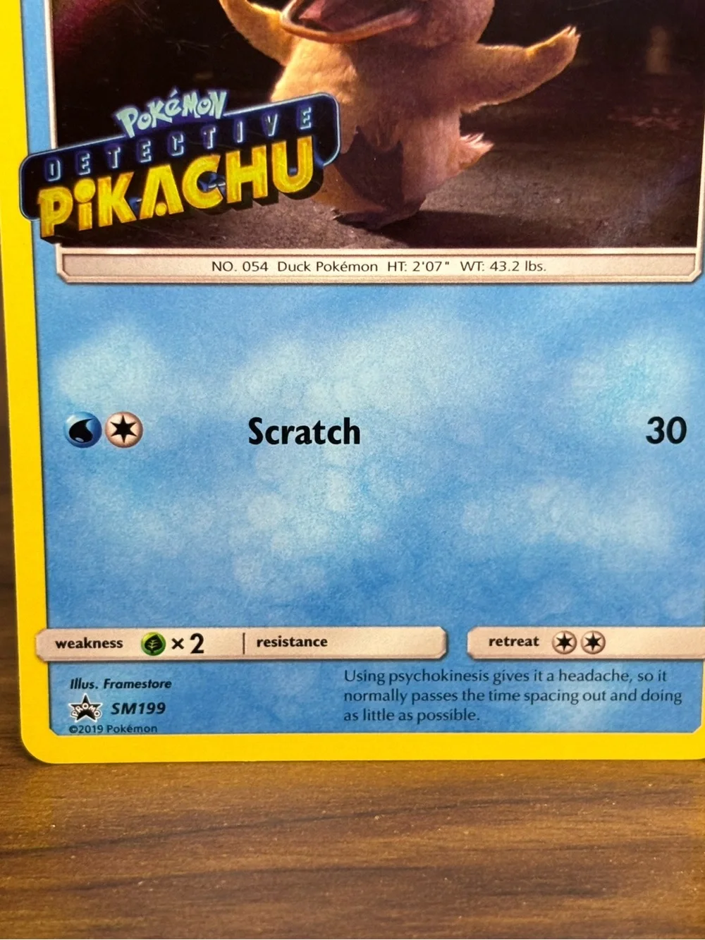 Psyduck SM199 Detective Pikachu Stamped Sun & Moon Black Star Promo Pokemon Card